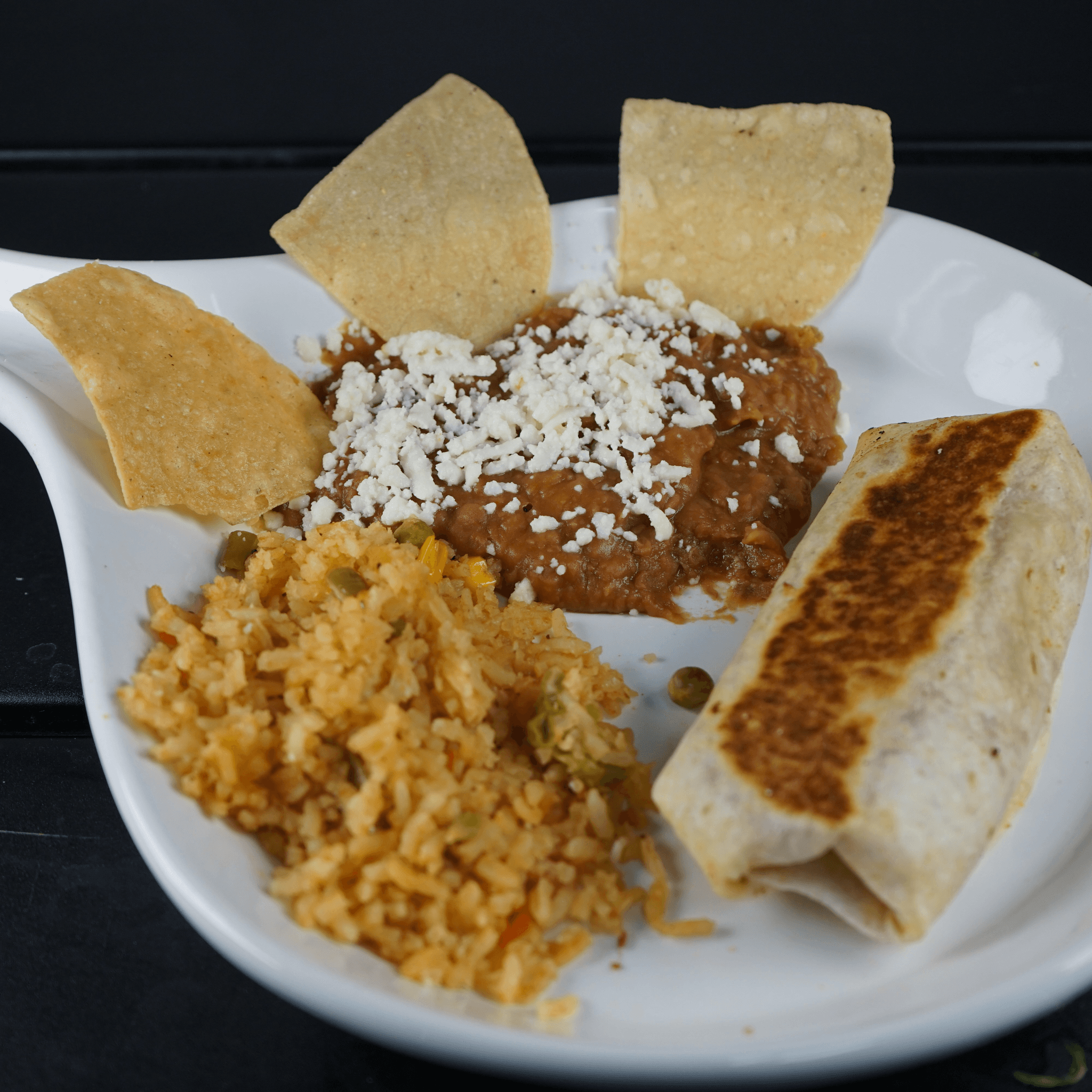 Mini burrito with cheese & beans.